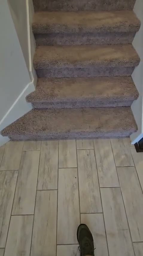 Video of carpeted stairs before the flooring was replaced